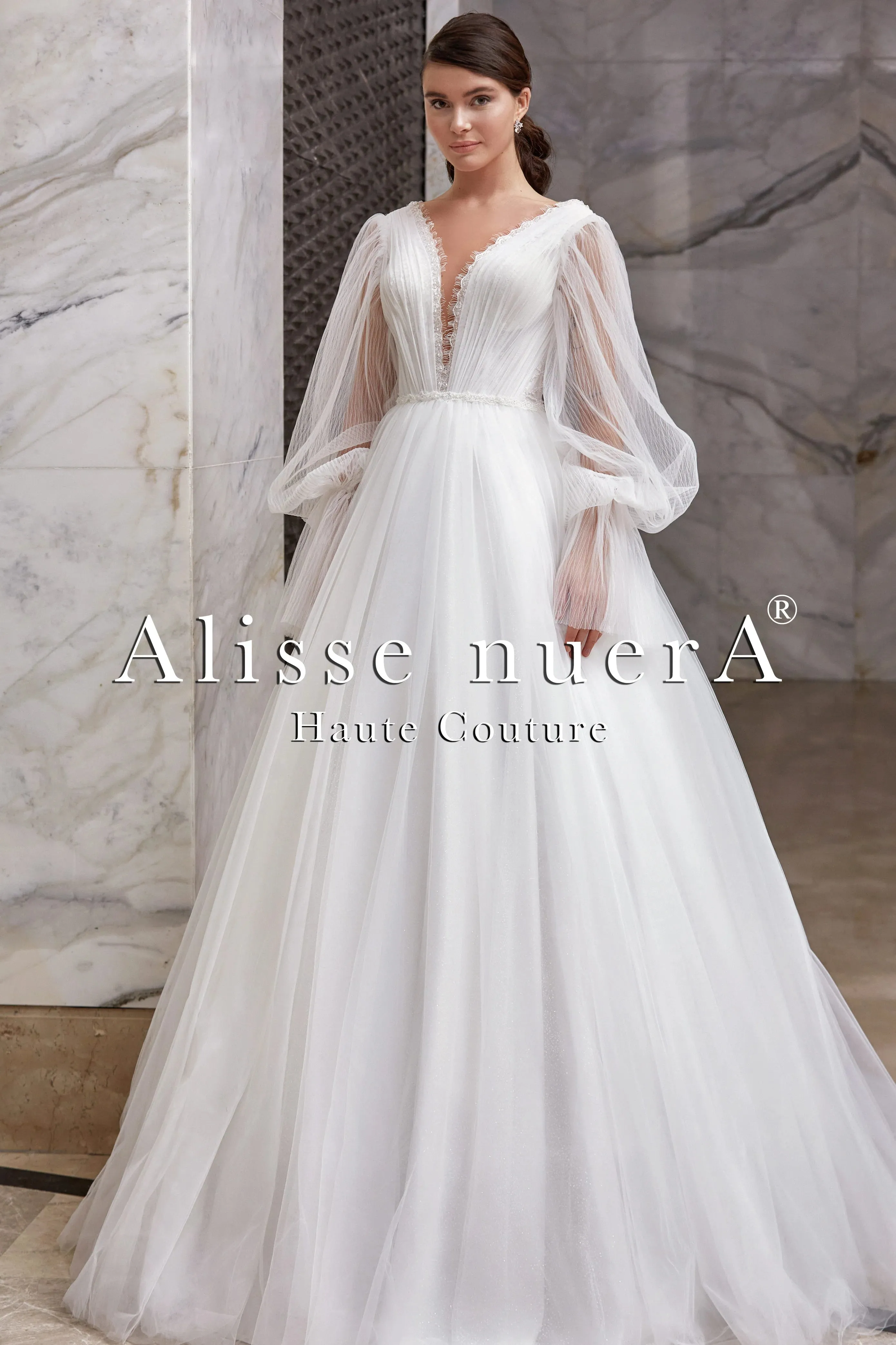 Empire Waist Wedding Dress Model with Long Balloon Sleeves and Deep V-Neck